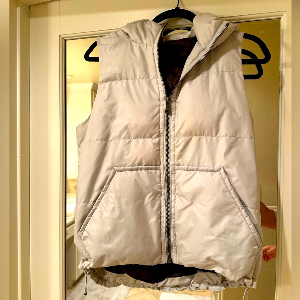 Coach vest with drawstring waste and hood! Worn twice, size Small